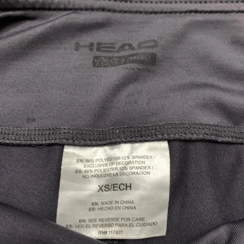 Head gray athletic pants turquoise on back legs Size XS